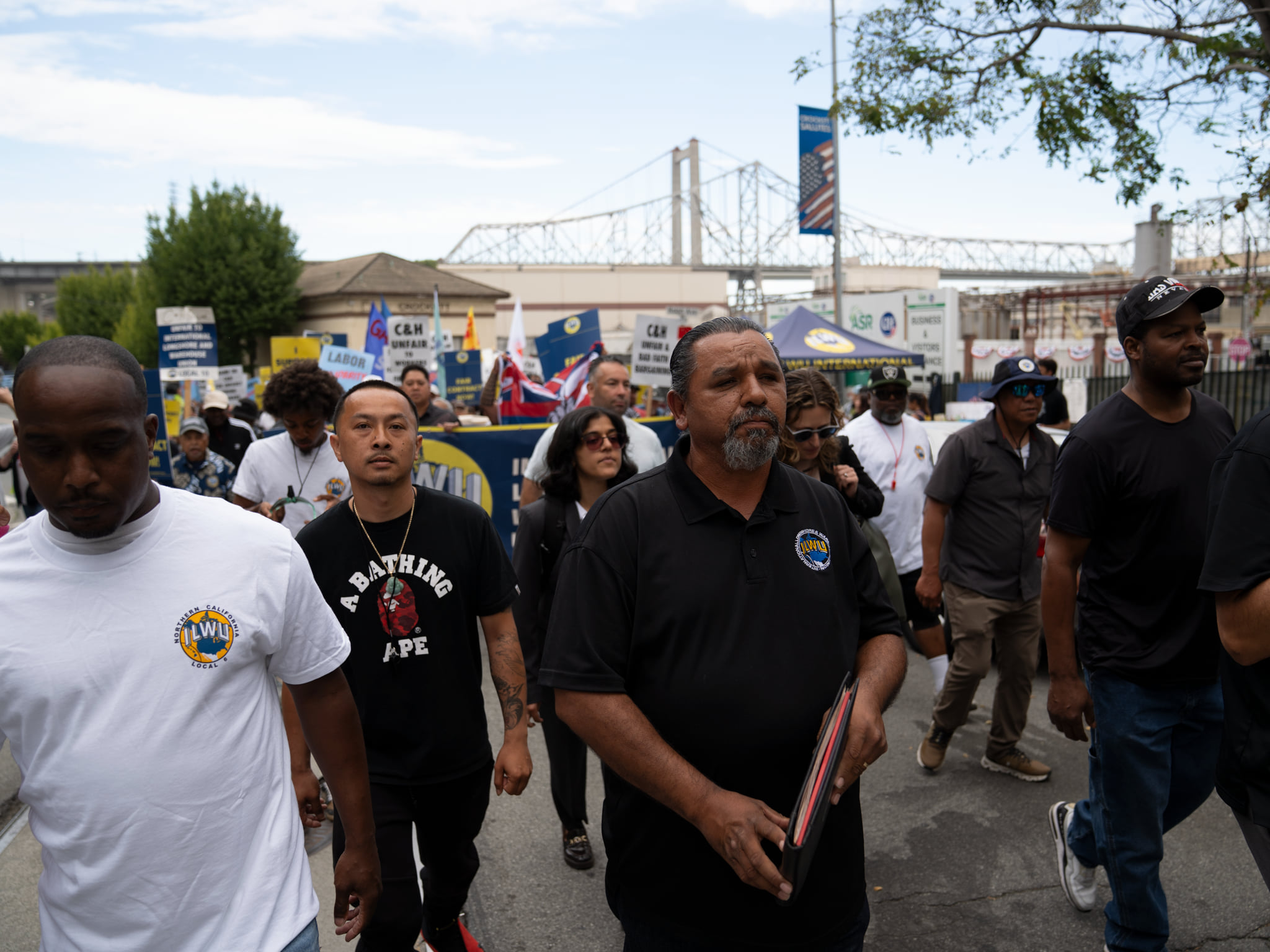 IWLU workers march outside of the C&H factory.
