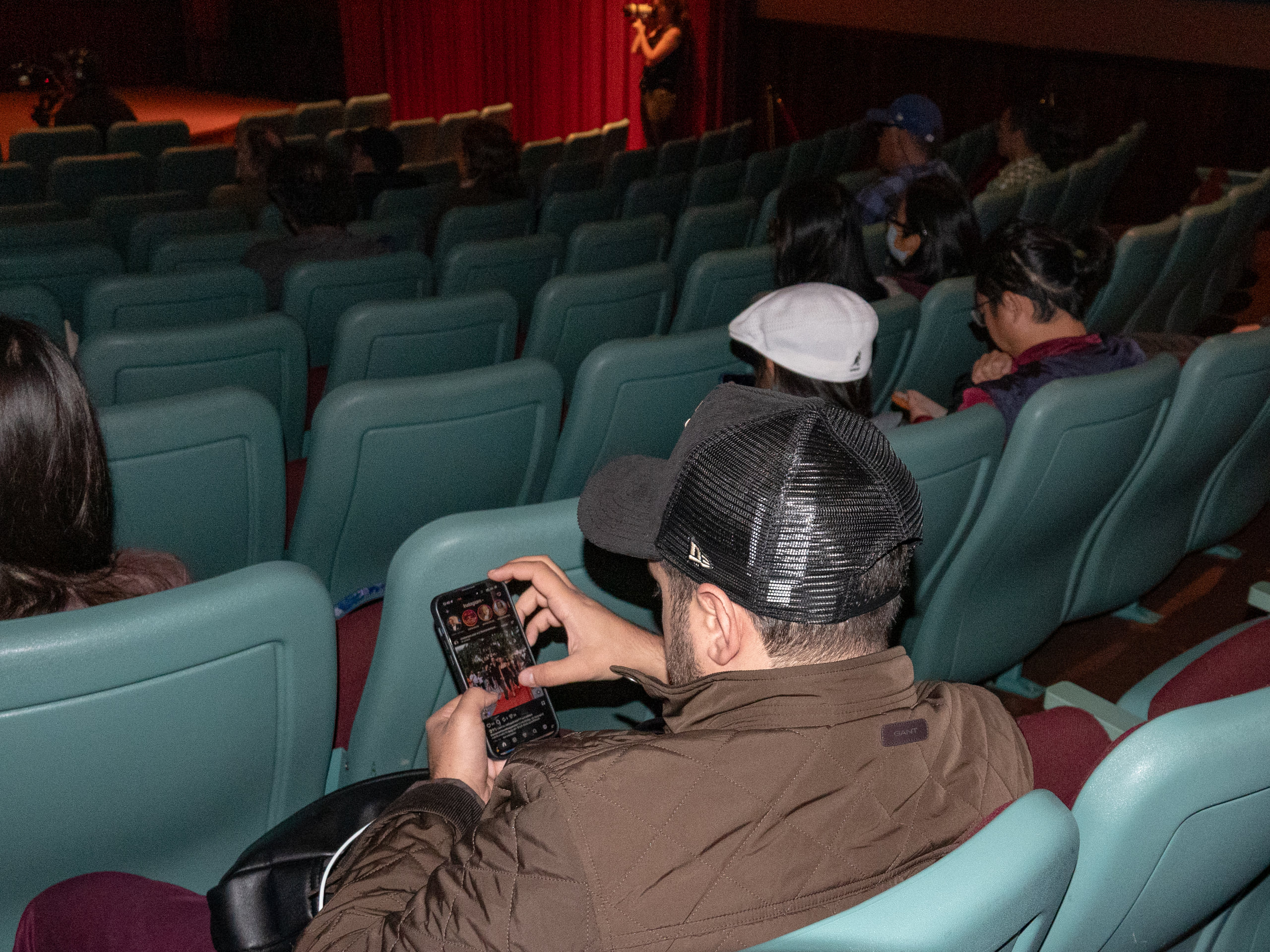 Guy on his phone.